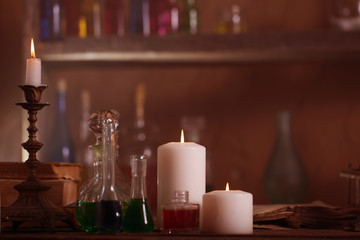 Wall Mural - Magic potion, ancient books and candles