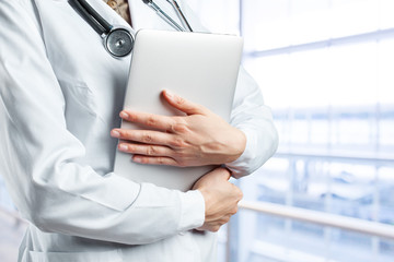 Wall Mural - Doctors using laptop at work