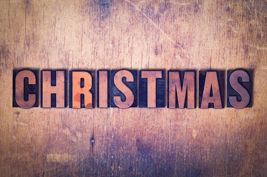 Christmas Theme Letterpress Word on Wood Background