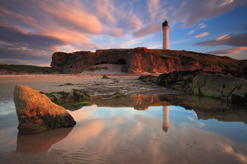 Amazing sunset over Lossiemouth lighthouse (Scotland UK)