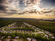 Aerial view of a Cookie Cutter Neighborhood with Sunset