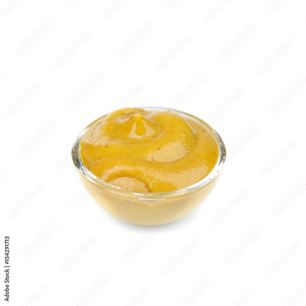 Bowl of delicious mustard sauce isolated on white