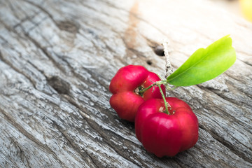 Acerola fruit close up on background.