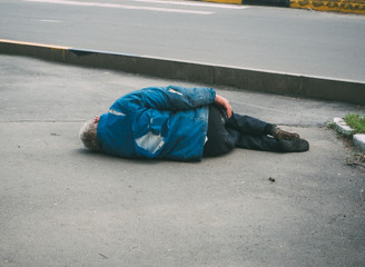 the man lying on the pavement . murder