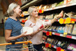 © caftor - Two women of all ages are buying pcheese