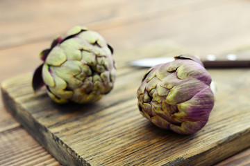 Two fresh artichokes