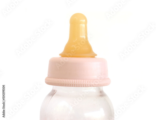 Fotografía baby's feeding bottle with teat on white background