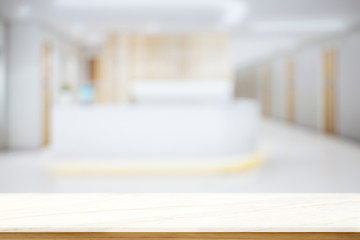 Empty Top Mable and wood table at hospital counter background. For product display montage.