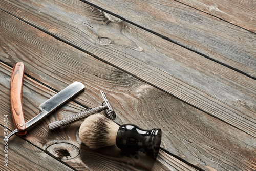 Fotografie, Obraz Vintage barber shop tools on wooden background