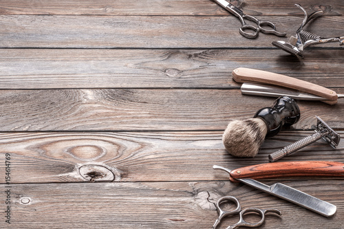 Fotografie, Obraz Vintage barber shop tools on wooden background