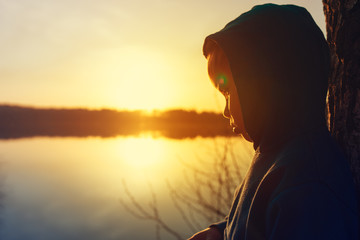 Wall Mural - Silhouette of little boy looking into the distance