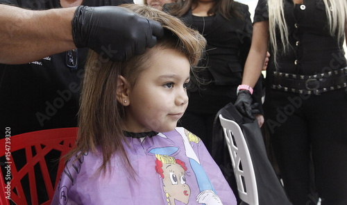 Hair Stylist Marcelo Avatte Fits A Natural Hair Wig On Alexandra