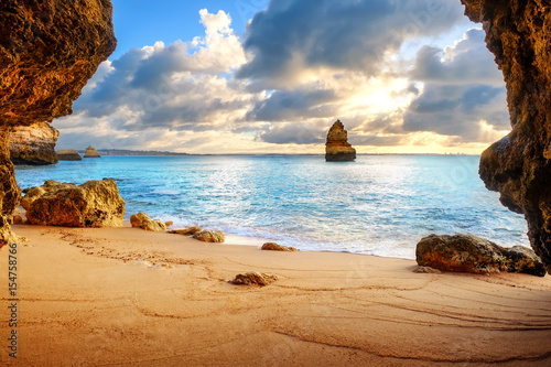 beautiful Atlantic ocean view horizon with sandy beach,  rocks and waves. Alg...