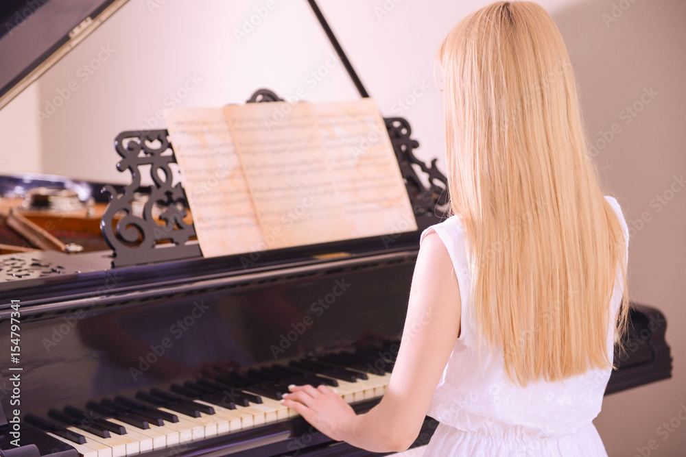Girl playing piano