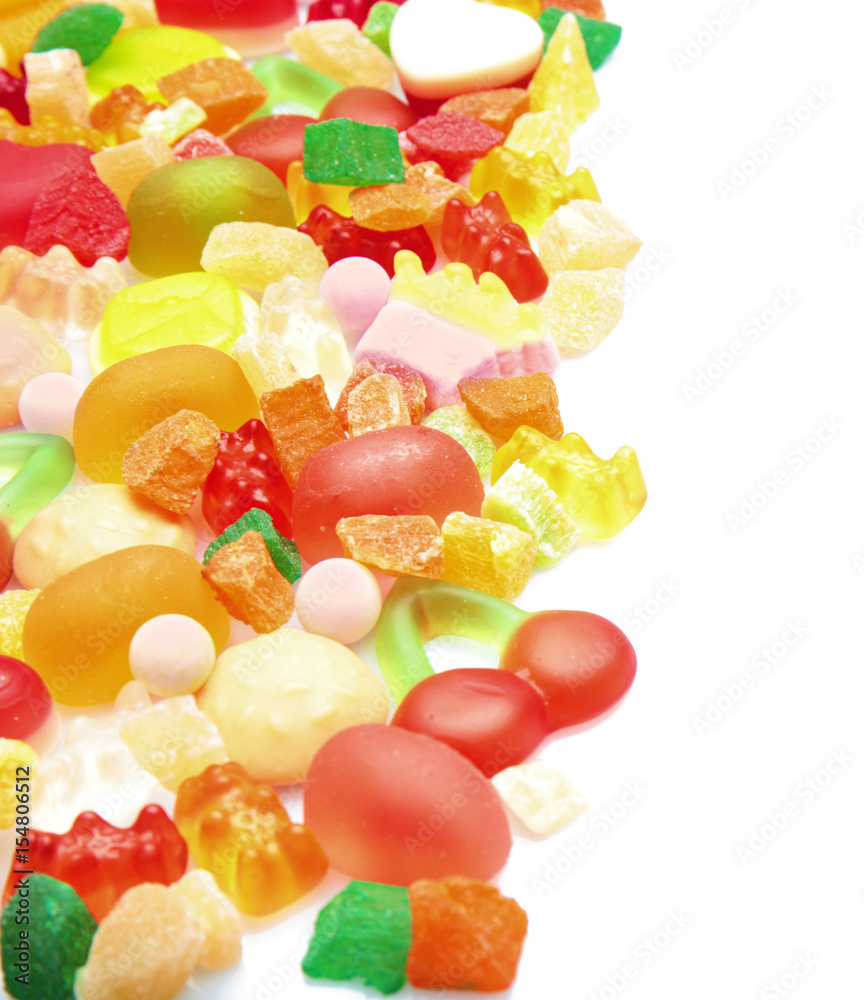 Tasty and colorful jelly candies on white background