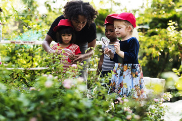 Teacher and kids school learning ecology gardening