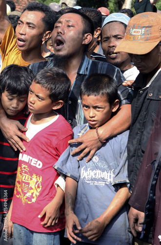 Sons Of Indonesian Militant Dulmatin Mourn During Their Father S