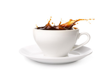 Wall Mural - Coffee splashing out of a cup isolated on white background.