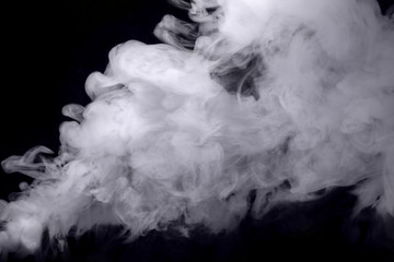 Wall Mural - Abstract white smoke against dark background