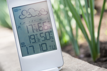 Wall Mural - Weather station device with weather conditions inside and outside