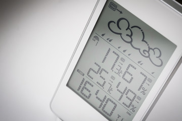 Wall Mural - Weather station device with weather conditions inside and outside. Light background.
