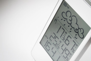 Wall Mural - Weather station device with weather conditions inside and outside. Light background.