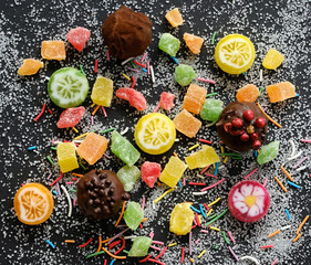 Wall Mural - Appetizing sweets on sugarly background