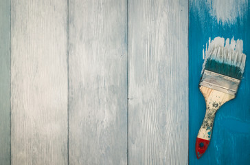 Wall Mural - top view repainting blue wooden boards in white color