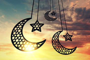 Wall Mural - Ramadam Kareem moon and star against sunrise/sunset background. 3D Rendering