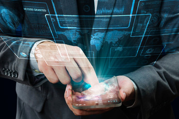 businessman using futuristic mobile device