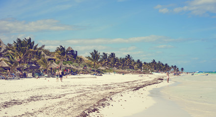 Wall Mural - Caribbean coast of Riviera Maya / Tourists at so called 