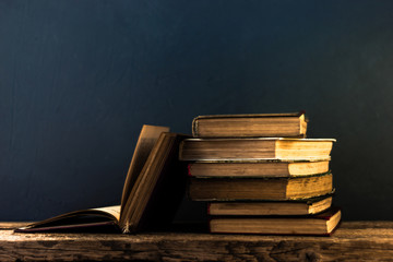 Poster - Books on an old wooden table