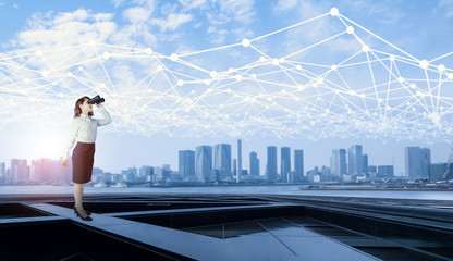 Poster - young business woman looking through field glasses and mesh communication network concept. Internet of Things. Information Communication Network. Smart city. abstract mixed media.