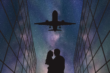Sticker - Lovers in airport at night. Vector illustration with silhouette of loving couple and flying aircraft under starry sky