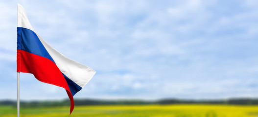 Russian flag against blue sky