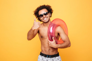 Portrait of a smiling african man in sunglasses