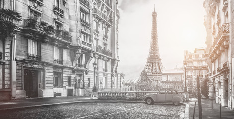 The eifel tower in Paris from a tiny street