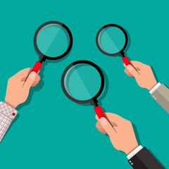 Poster - Three hands holding a magnifying glass