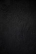 © aradaphotography - Dark grey black slate background or natural stone texture.