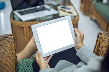 Wall Mural - Beautiful business working woman using Ipad while working with laptop