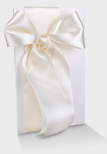 Postcard White Designer Cardboard Tabby With White Satin Bow Wedding Invitation On A Light Cloth Grey Background
