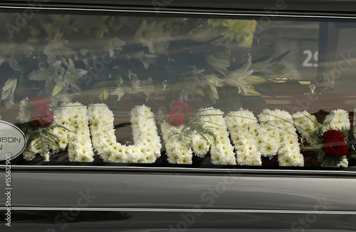 A Floral Tribute Sits With The Coffin Of School Teacher Ann