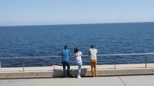 Friends Looking Out To Sea