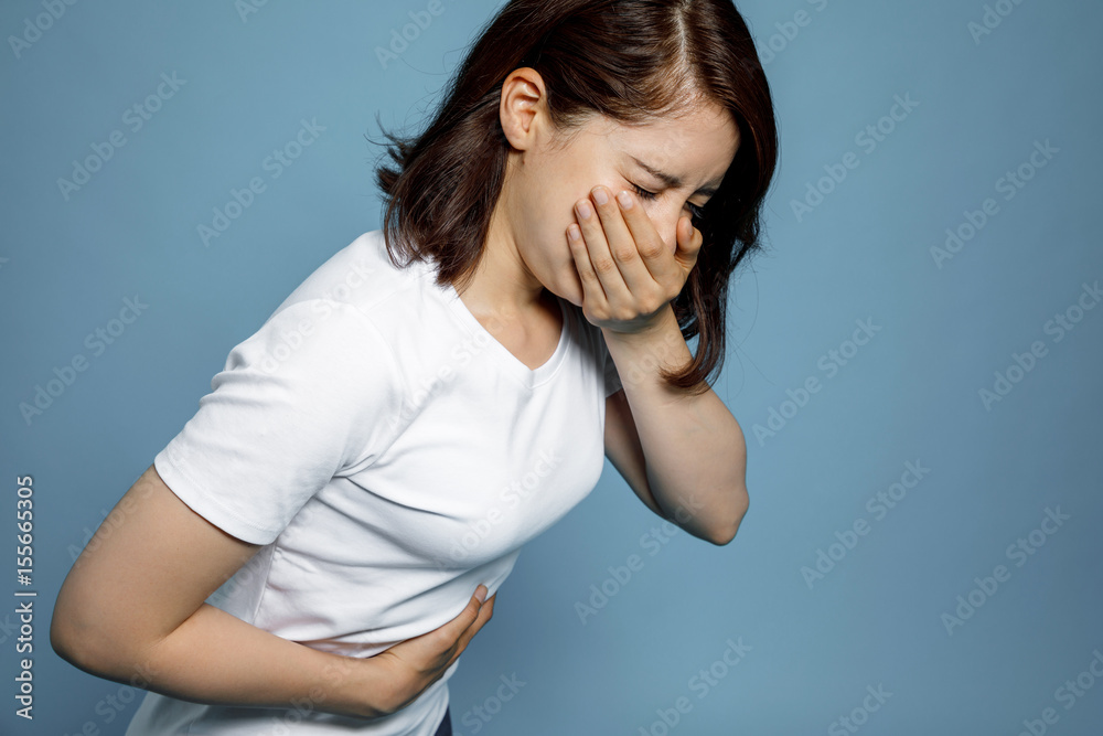 young woman feeling nauseated. - obrazy, fototapety, plakaty 