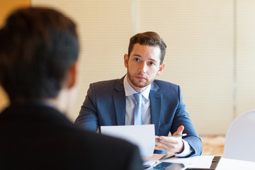 Closeup of Boss Interviewing Candidate