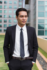 Canvas Print - Closeup of Confident Business Man Standing Outside