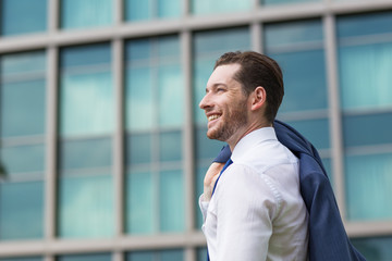 Canvas Print - Closeup of Happy Business Man Standing Outside