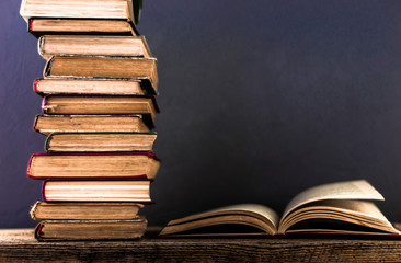 Poster - Books on an old wooden table