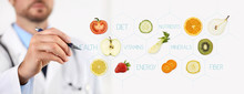 Healthy Food Concept, Hand Of Nutritionist Doctor Pointing Fruit With Pen