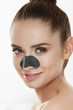 Cosmetology. Beautiful Female With Black Mask On Nose